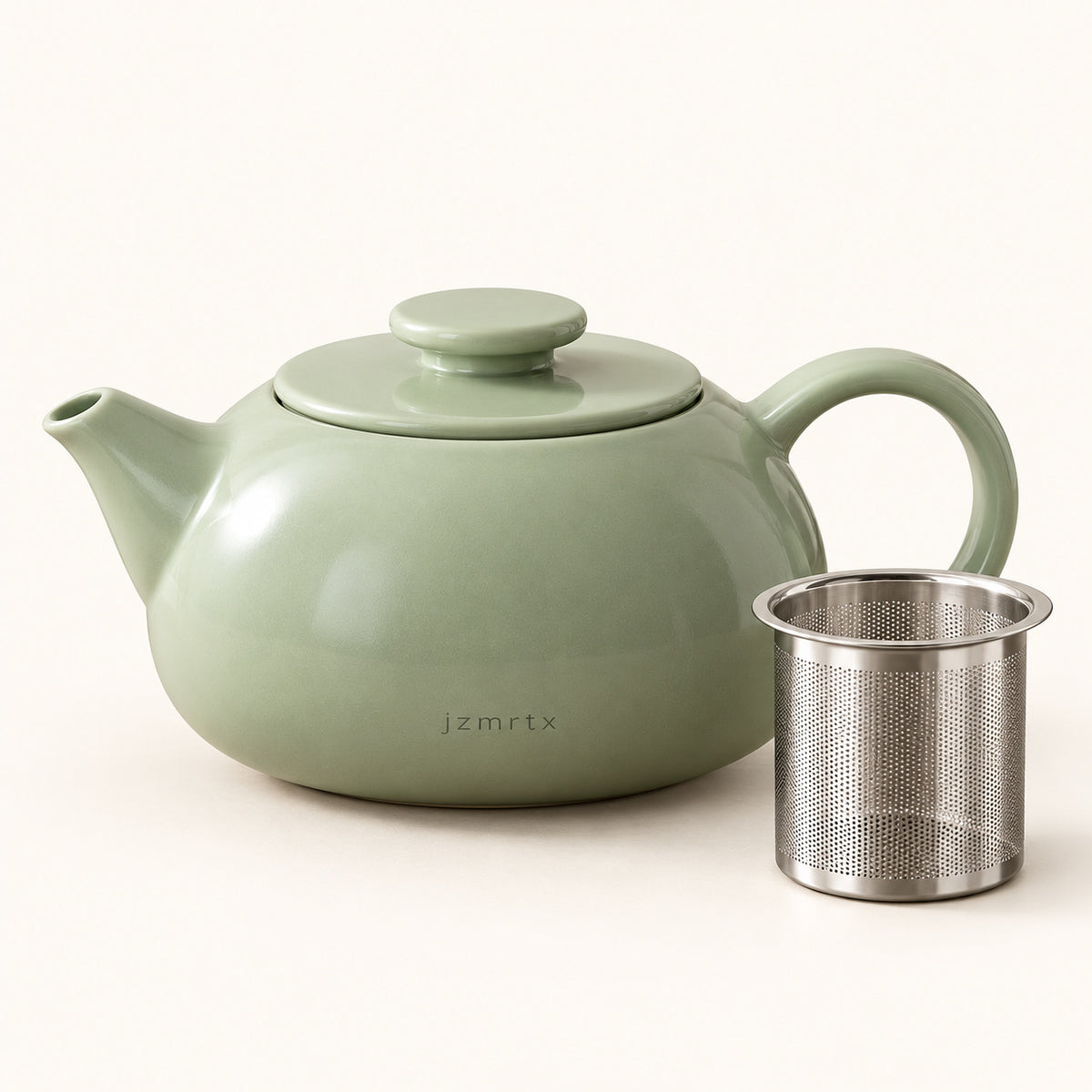 jzmrtx Pebble Ceramic Infuser Teapot — studio product view